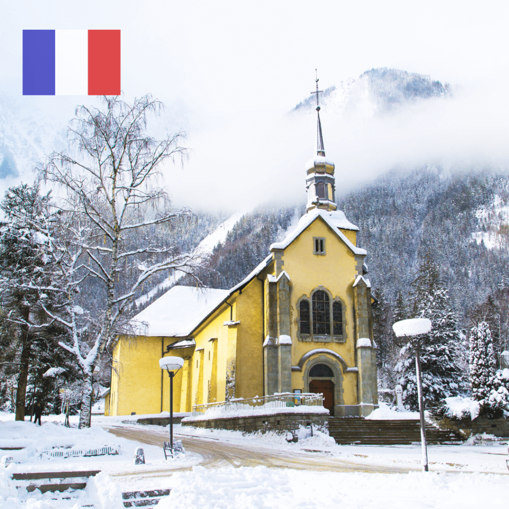 A breathtaking winter destination in Chamonix, France, featuring the majestic snow-covered peaks of the French Alps, cozy chalets nestled in the valley, and ski slopes bustling with activity.