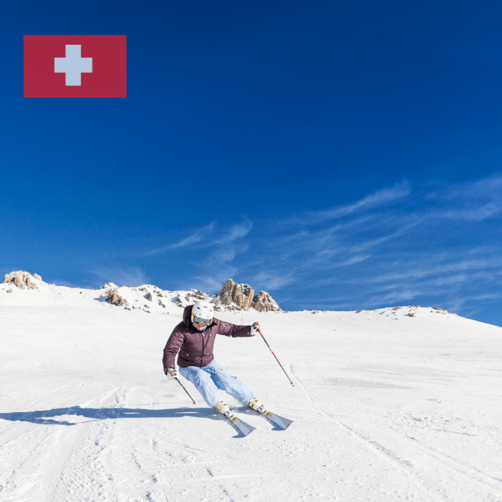 A picturesque winter scene in St. Moritz, Switzerland, featuring snow-covered mountains, luxury hotels, and frozen lakes, set against a clear blue sky